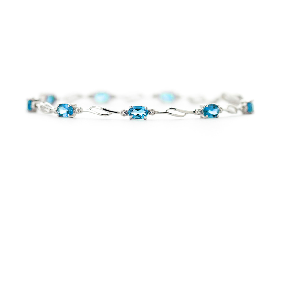 14K. GOLD TENNIS BRACELET WITH BLUE TOPAZ & DIAMONDS (White Gold) - Picture 2 of 6
